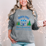 North Pole Bed & Breakfast Christmas Sweater - Cozy Holiday Sweatshirt